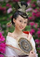 練束梅